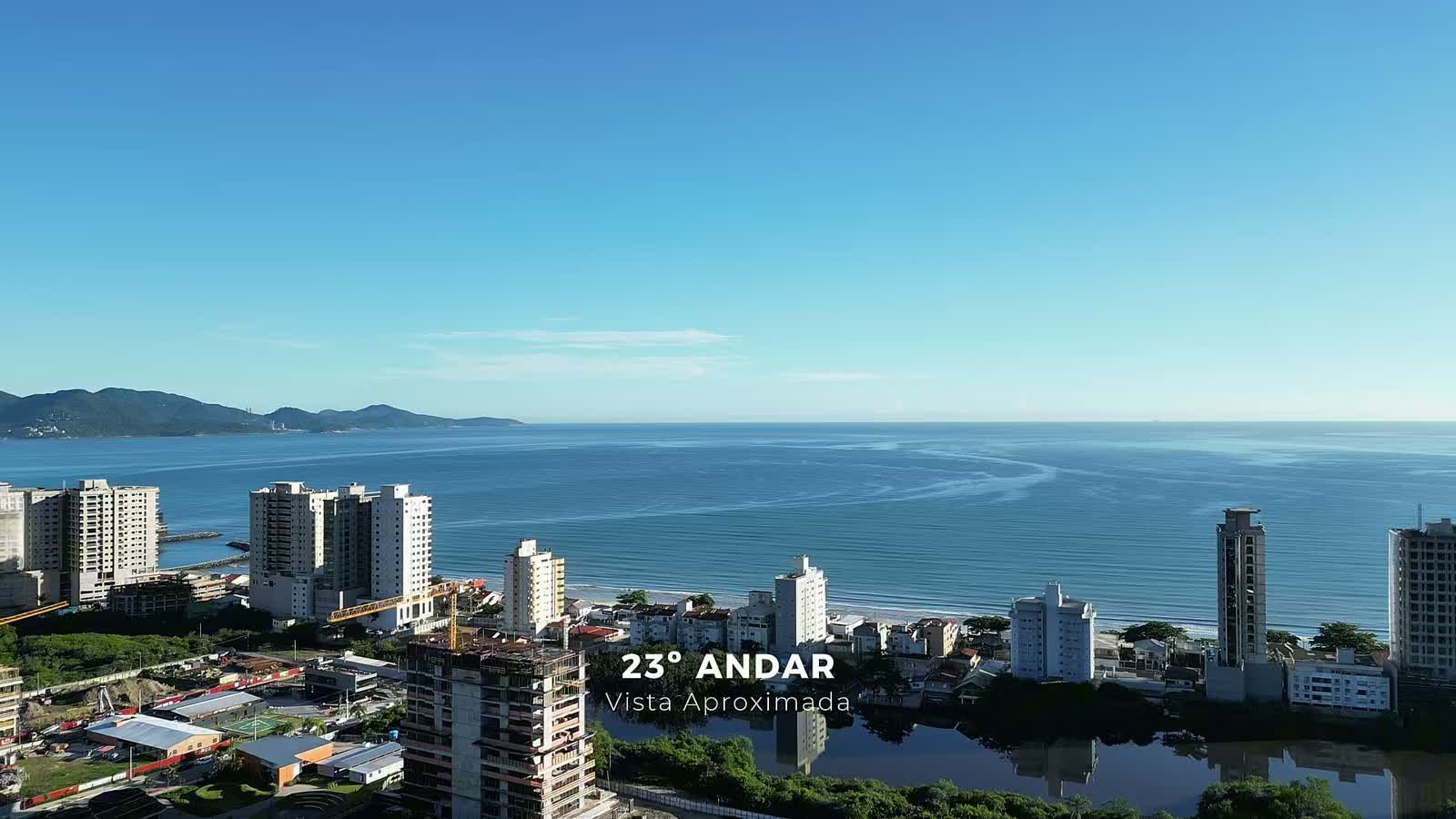 Vista aproximada do 23º andar do Terra Tower — mar, lagoa e praia do Perequê